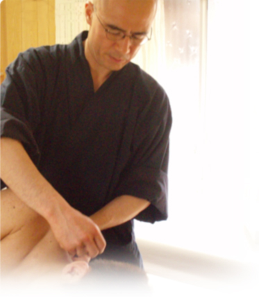 治療中の玉水擁